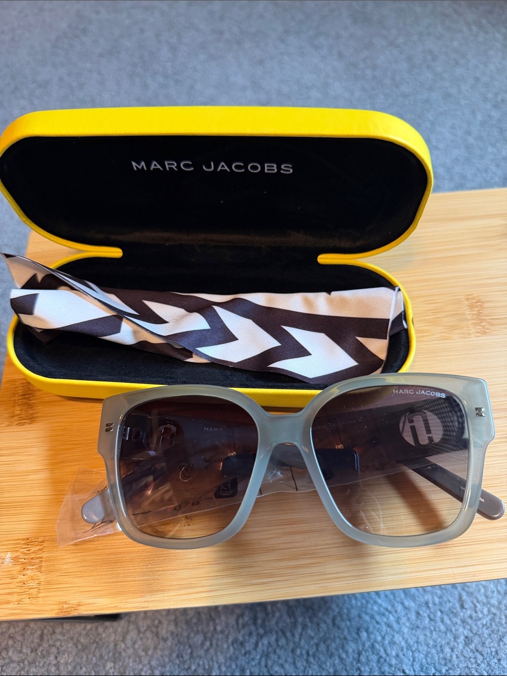 Marc Jacobs Bright Yellow Eyewear Case with glasses